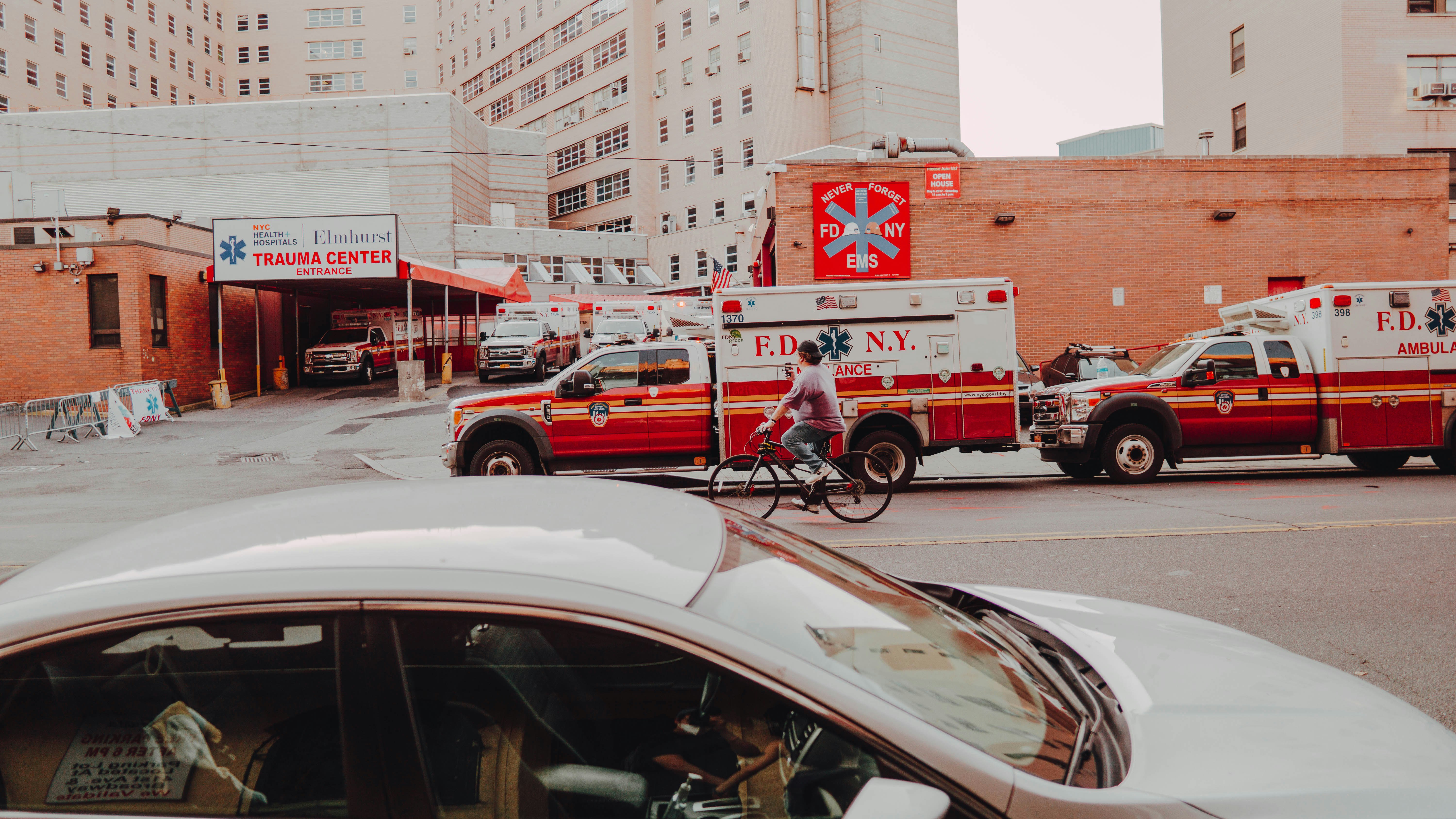 white and red fire truck on road during daytime